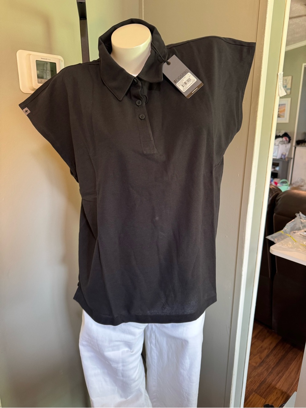 NWT Figs women’s Black Short-SleevPolo Top - size Medium